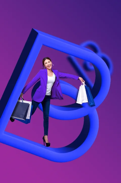 Smiling woman with shopping bags, symbolizing vibrant branding and creative services offered on the Branding page