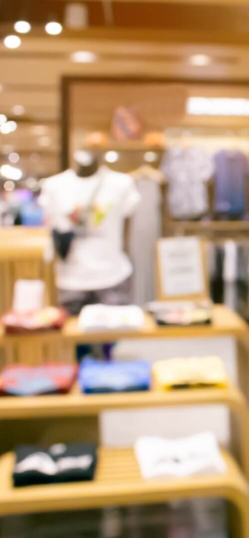 Person browsing an eCommerce portal with product information, showcasing web design and development solutions for effective product management