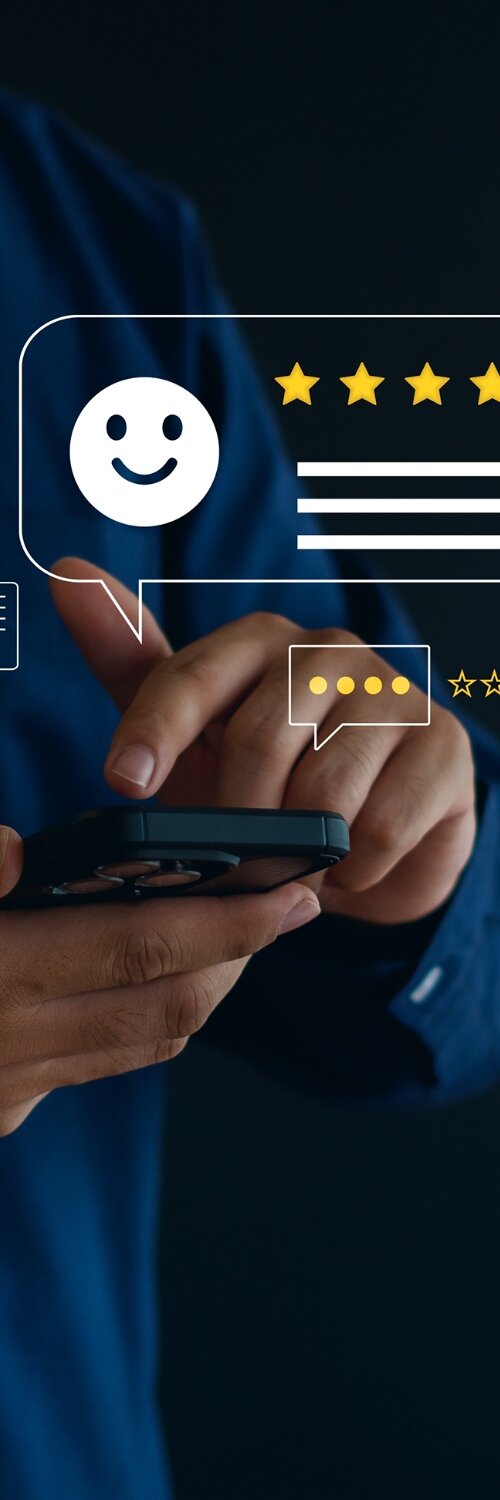 Hand stacking cubes with happy and sad faces, representing customer feedback analysis by an online marketing service provider