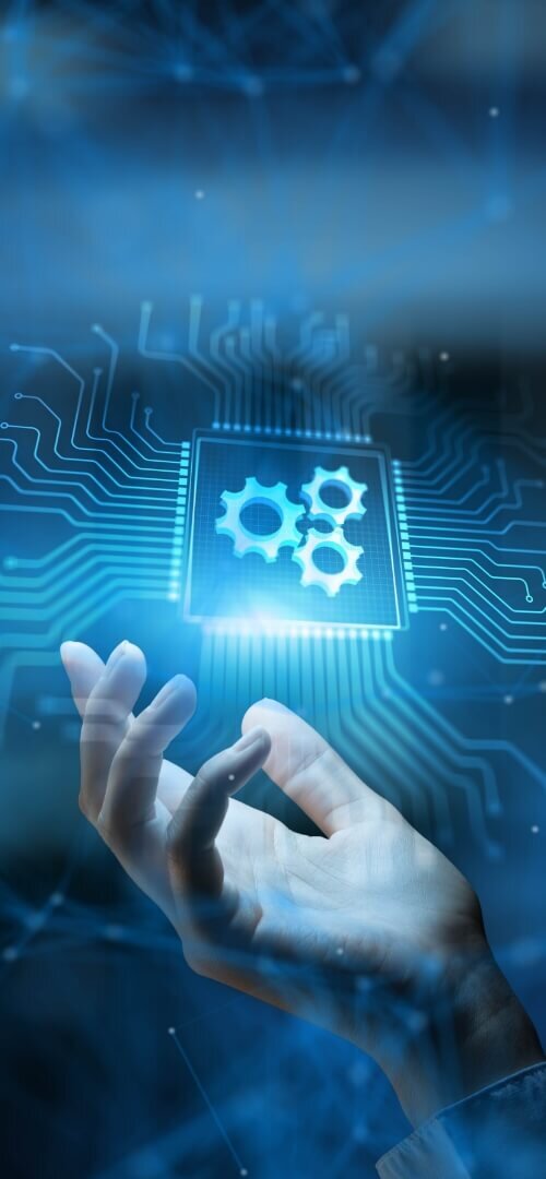 Illustration of hands typing on a laptop with puzzle pieces and lightbulbs, representing PIM Implementation Services and PIM Integration Services