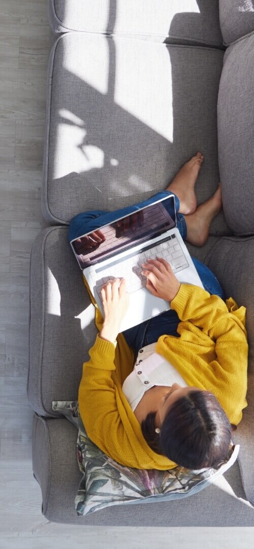 Illustration showing PIM Implementation Services with a hand interacting with a mobile app, symbolizing PIM integration services