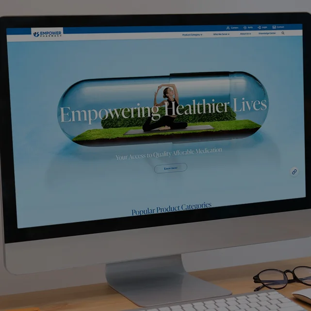 Website design and development services showcased through an engaging Empower Pharmacy website with a unique healthcare-themed design